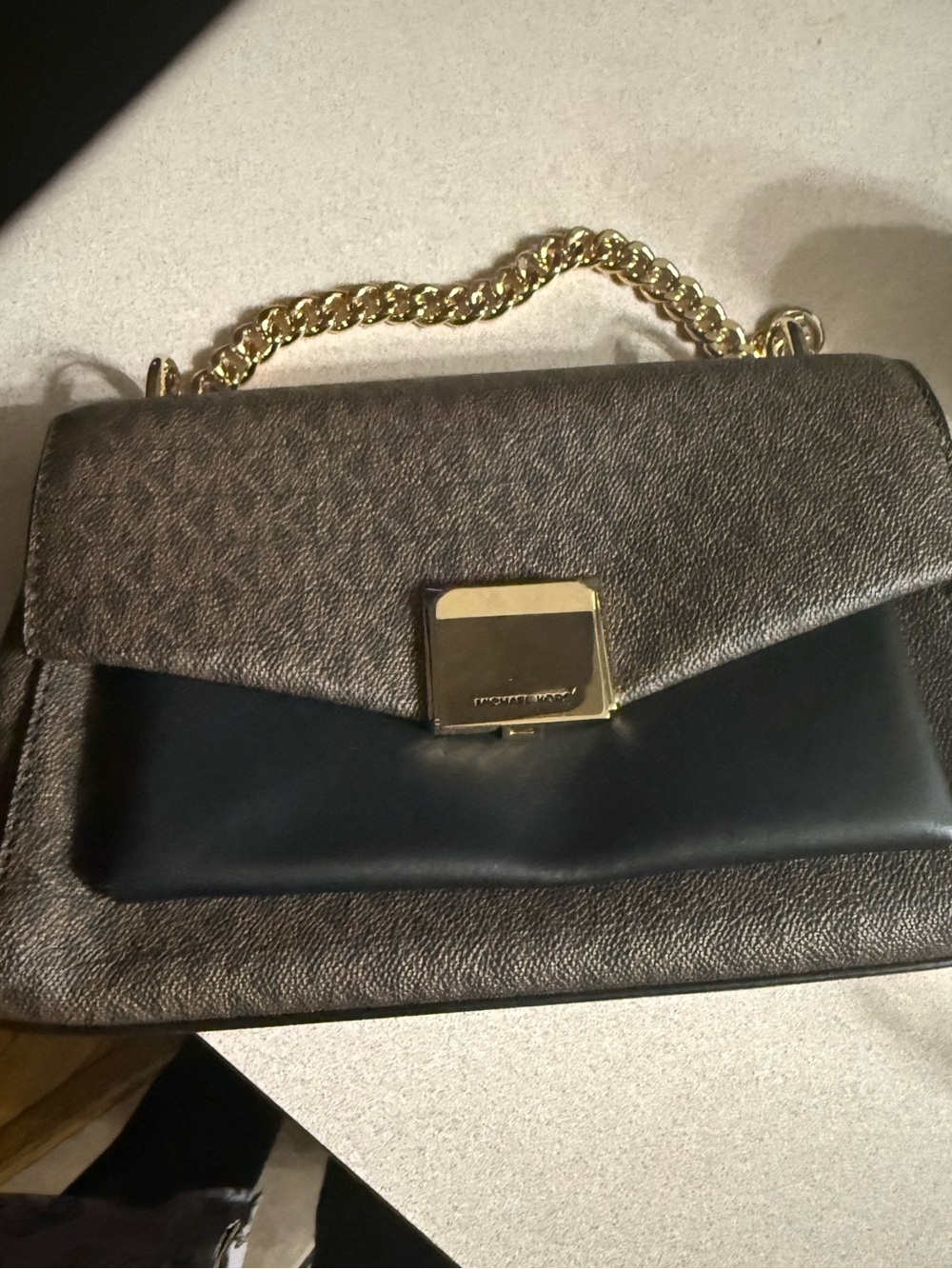 Michael Kors Brown Monogram Satchel with Black Front Pocket and Gold Chain